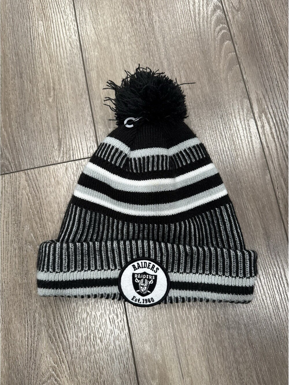 New Era NFL Las Vegas Raiders 100th NFL Anniversary Lined Cuffed Pom Beanie OS